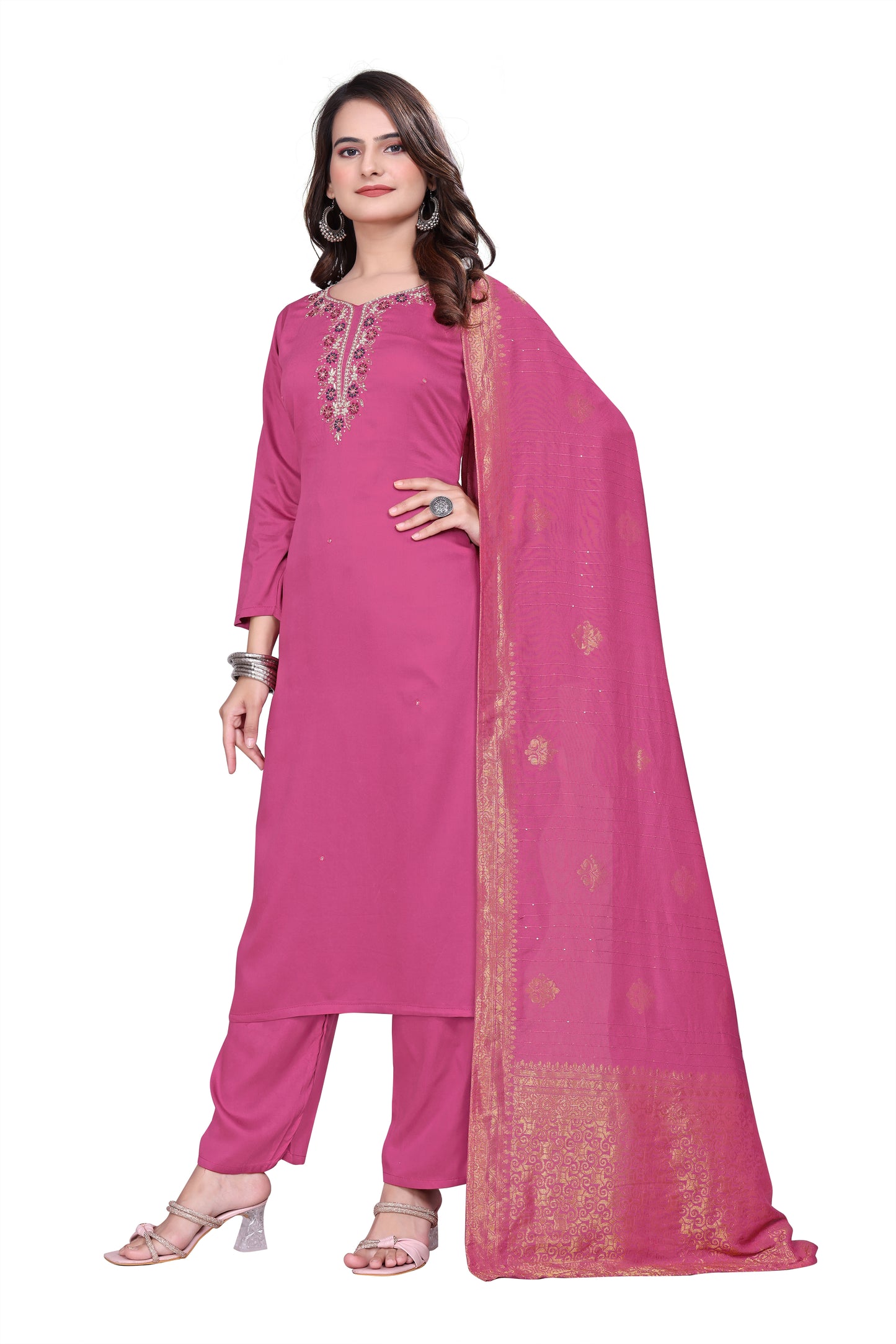 Woman wearing a pink traditional outfit with a dupatta on a white background